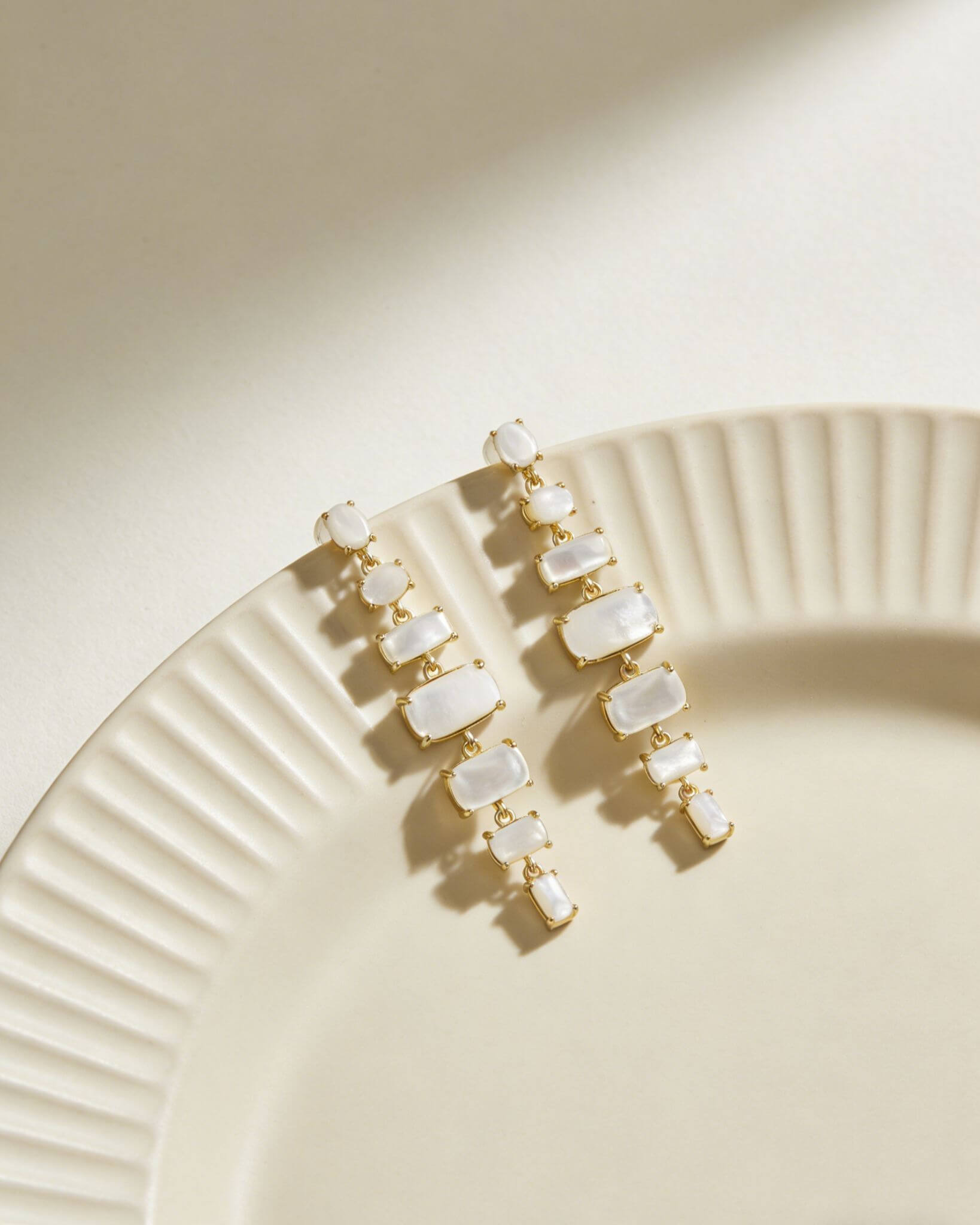 Graduated Mother of Pearl Dangle Earrings